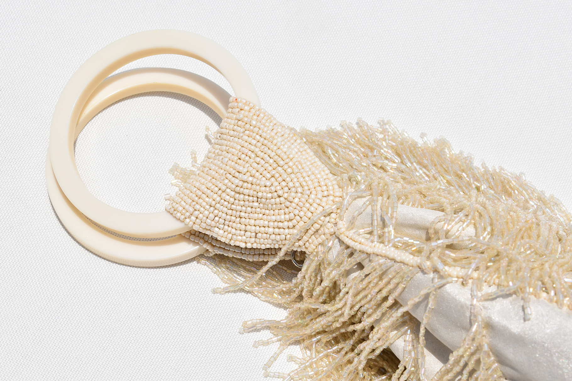 Wristlet fringe bag - Beige
